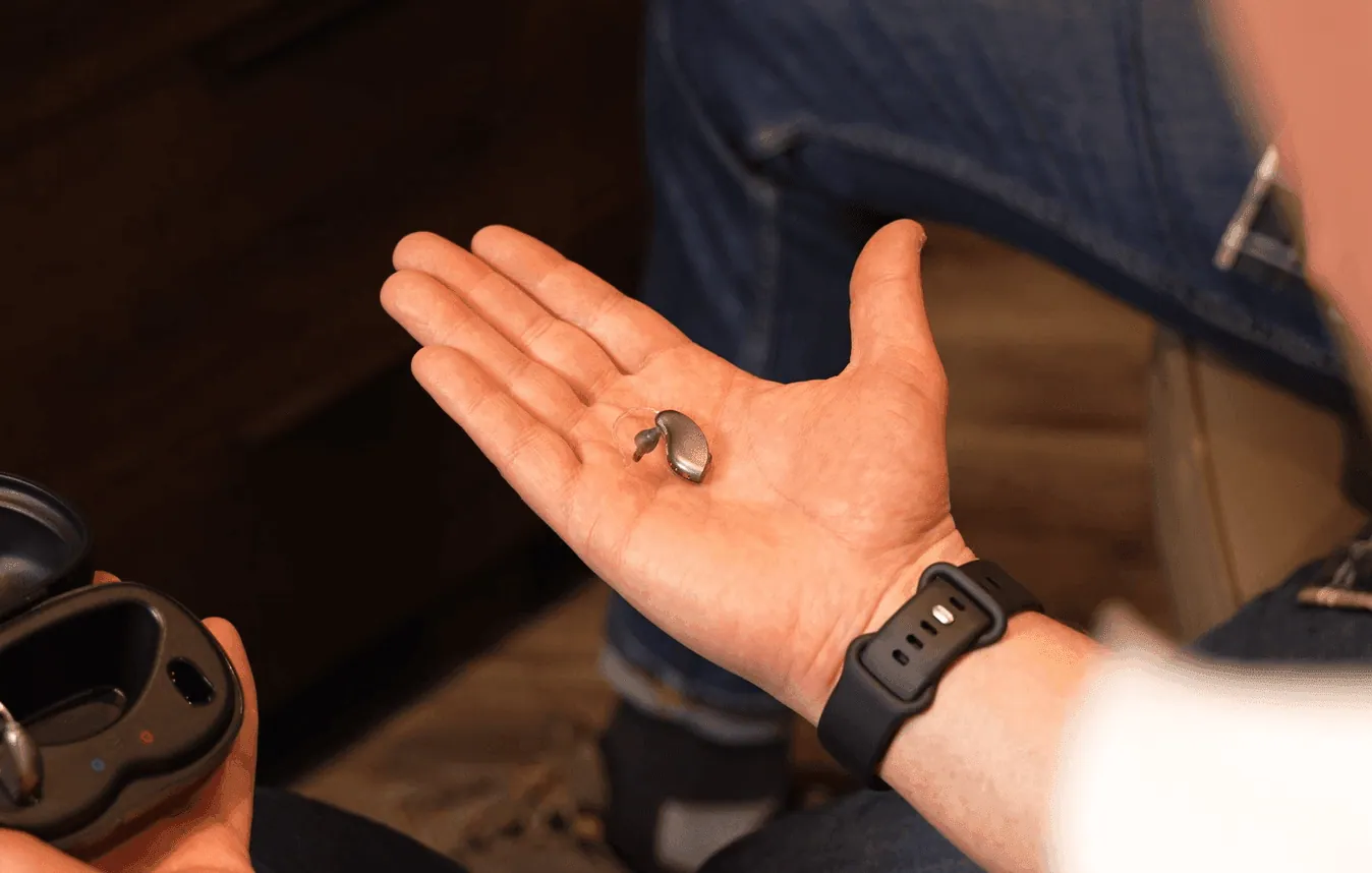 An audiologist carrying out a hearing test