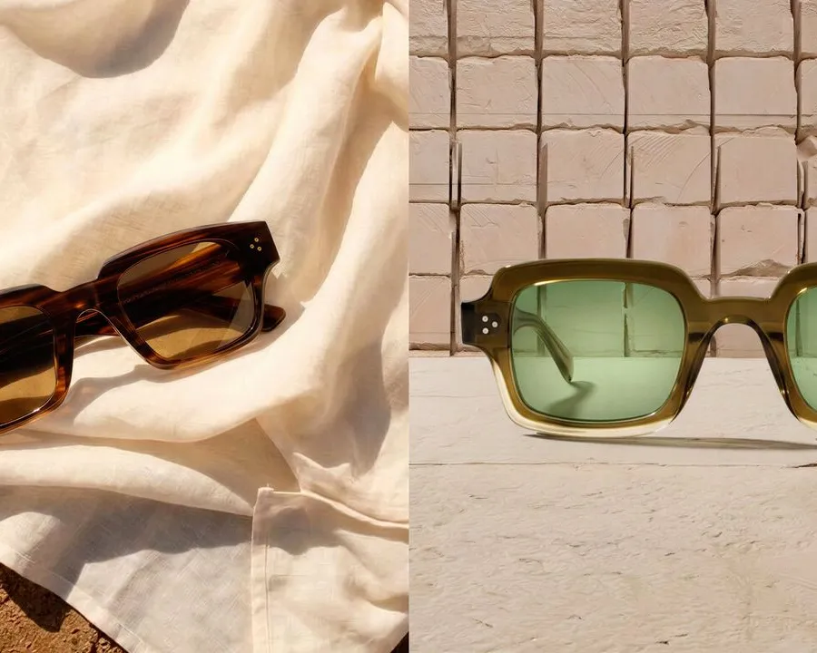 Acetate spectacle frames resting on a woven cream surface