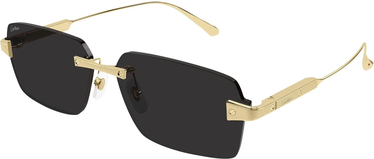 Cartier CT0652S colour 001, three quarter view. Angular rimless sunglasses with gold-coloured temples and dark lenses.