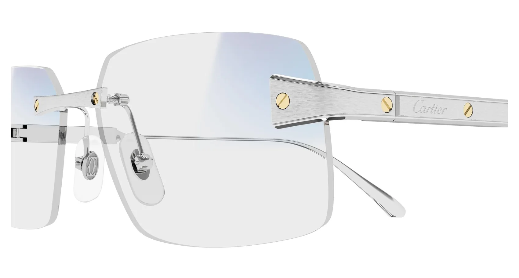 Cartier CT0655S colour 001, detail view. Rimless sunglasses with silver-coloured temples and pale lenses.