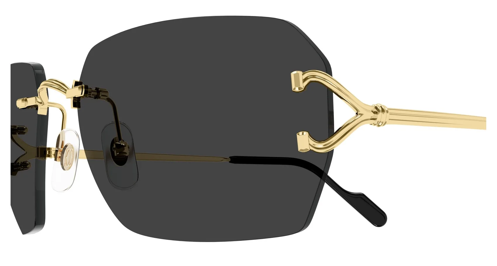 Cartier CT0664S colour 001, detail view. Geometric rectangular rimless sunglasses with gold-coloured temples.