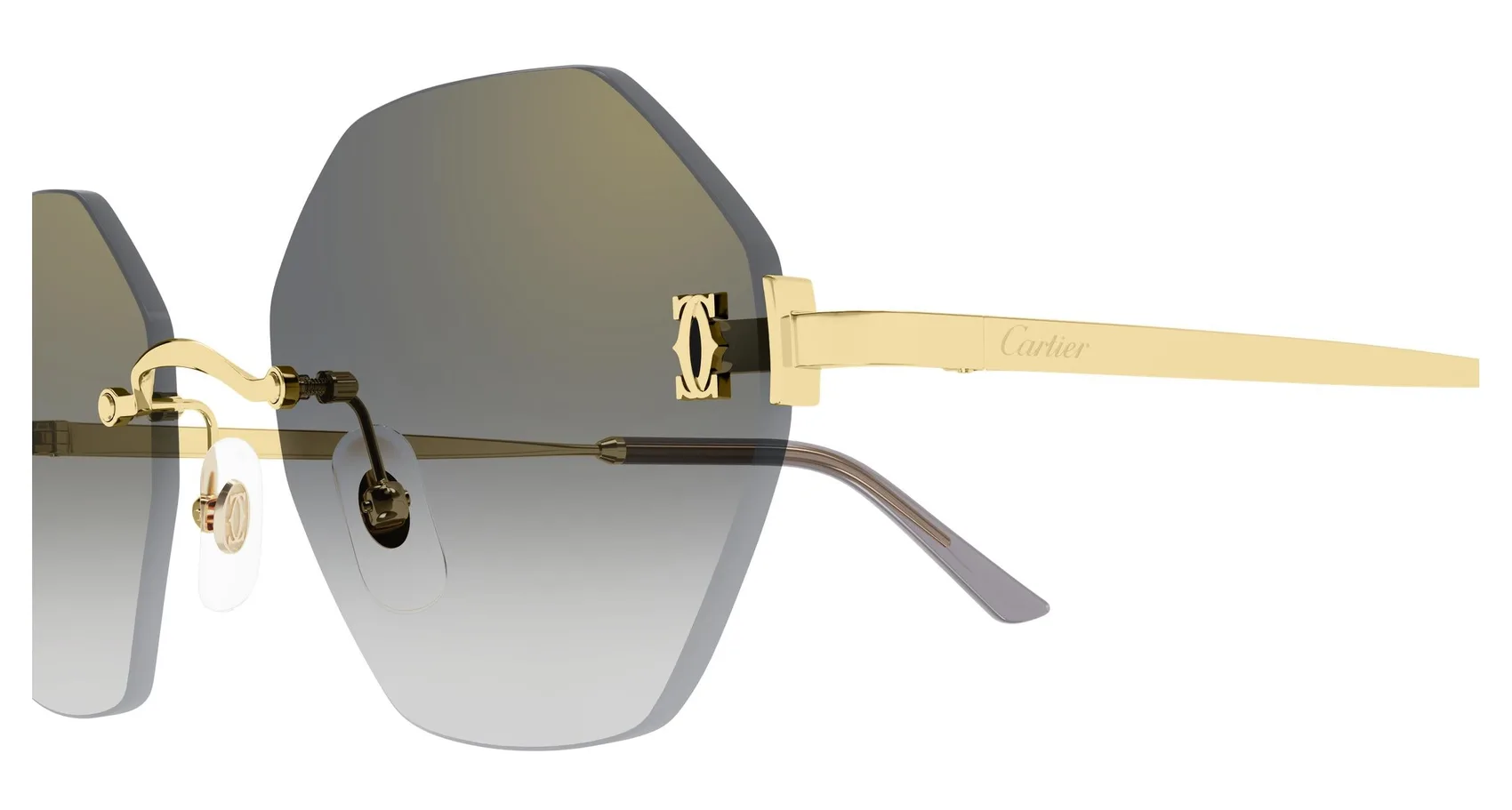 Cartier CT0671S colour 001, detail view. Octagonal rimless sunglasses with gold-coloured temples and gradient lenses.