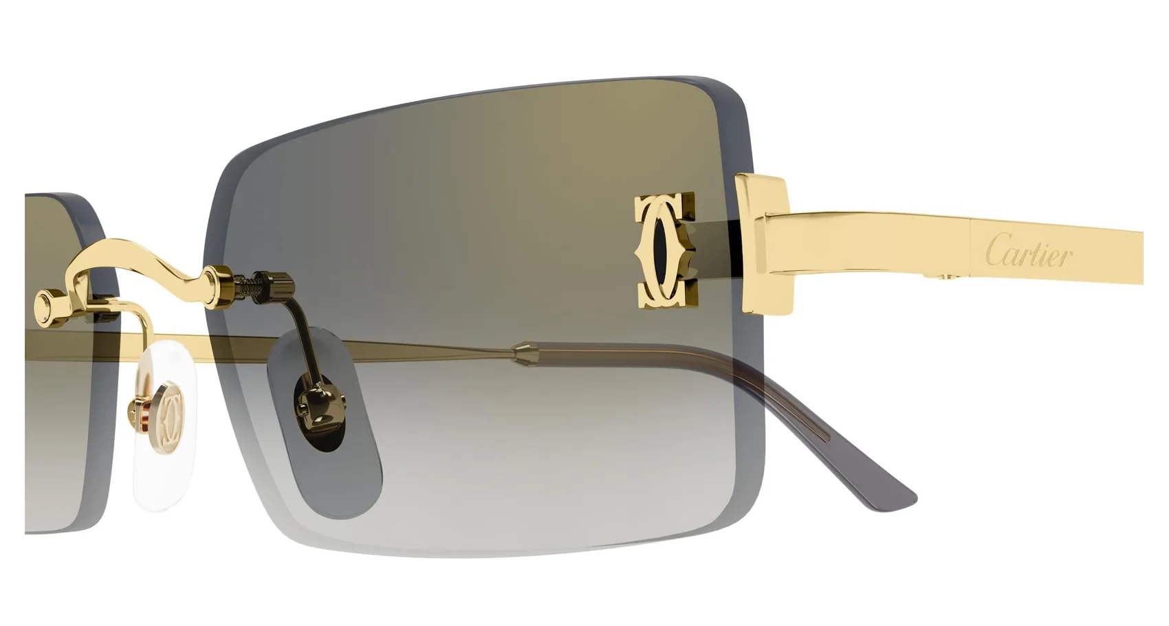 Cartier CT0672S colour 001, detail view. Shallow rectangular rimless sunglasses with gold-coloured temples and gradient lenses.