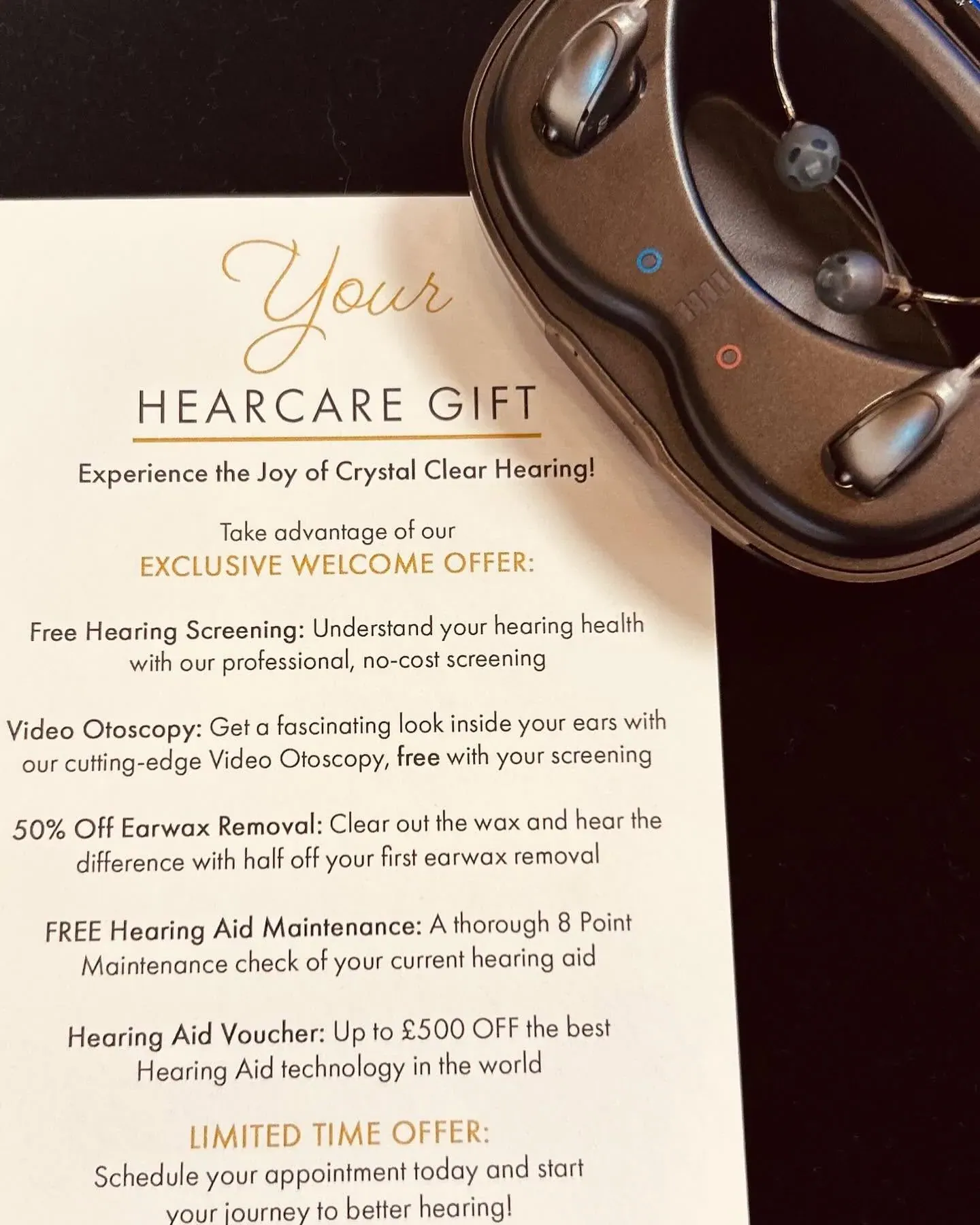 The STOTTS Hearing Care Welcome Offer gift card, shown beside premium hearing aids