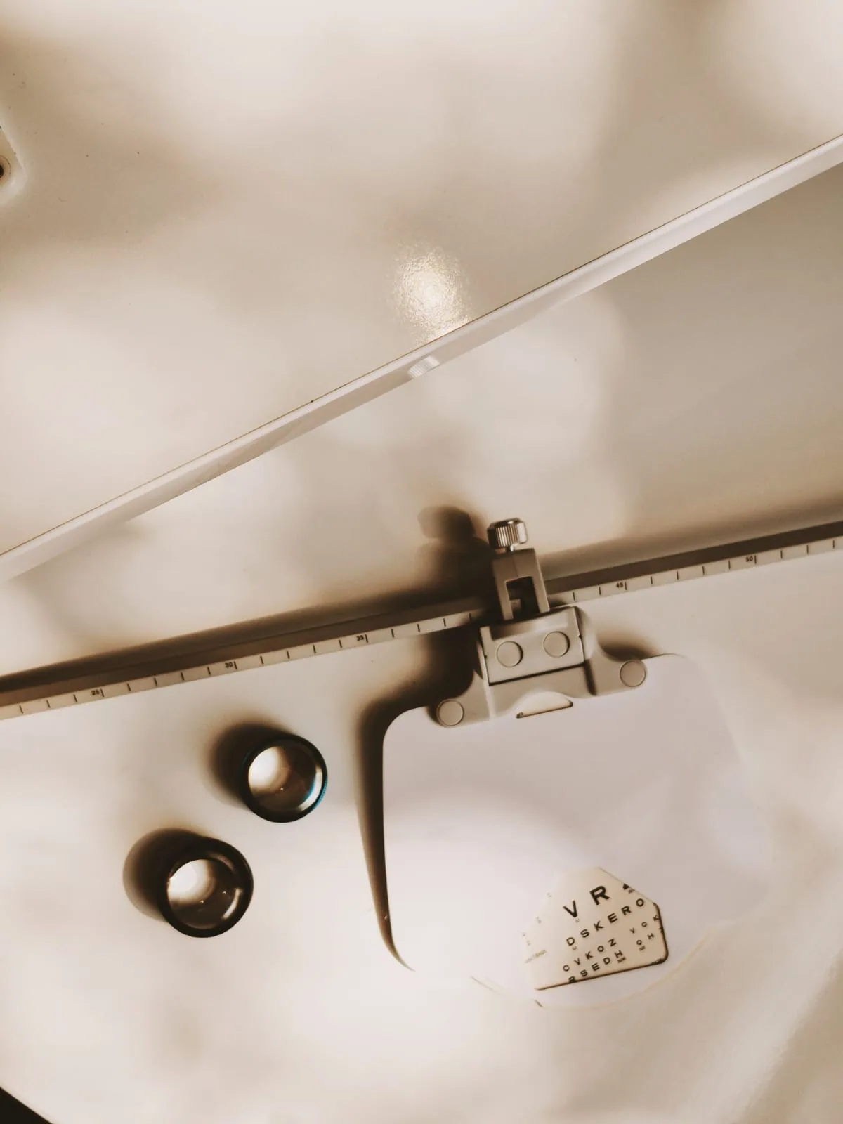 Clinical eye-testing equipment used during a full examination at STOTTS.
